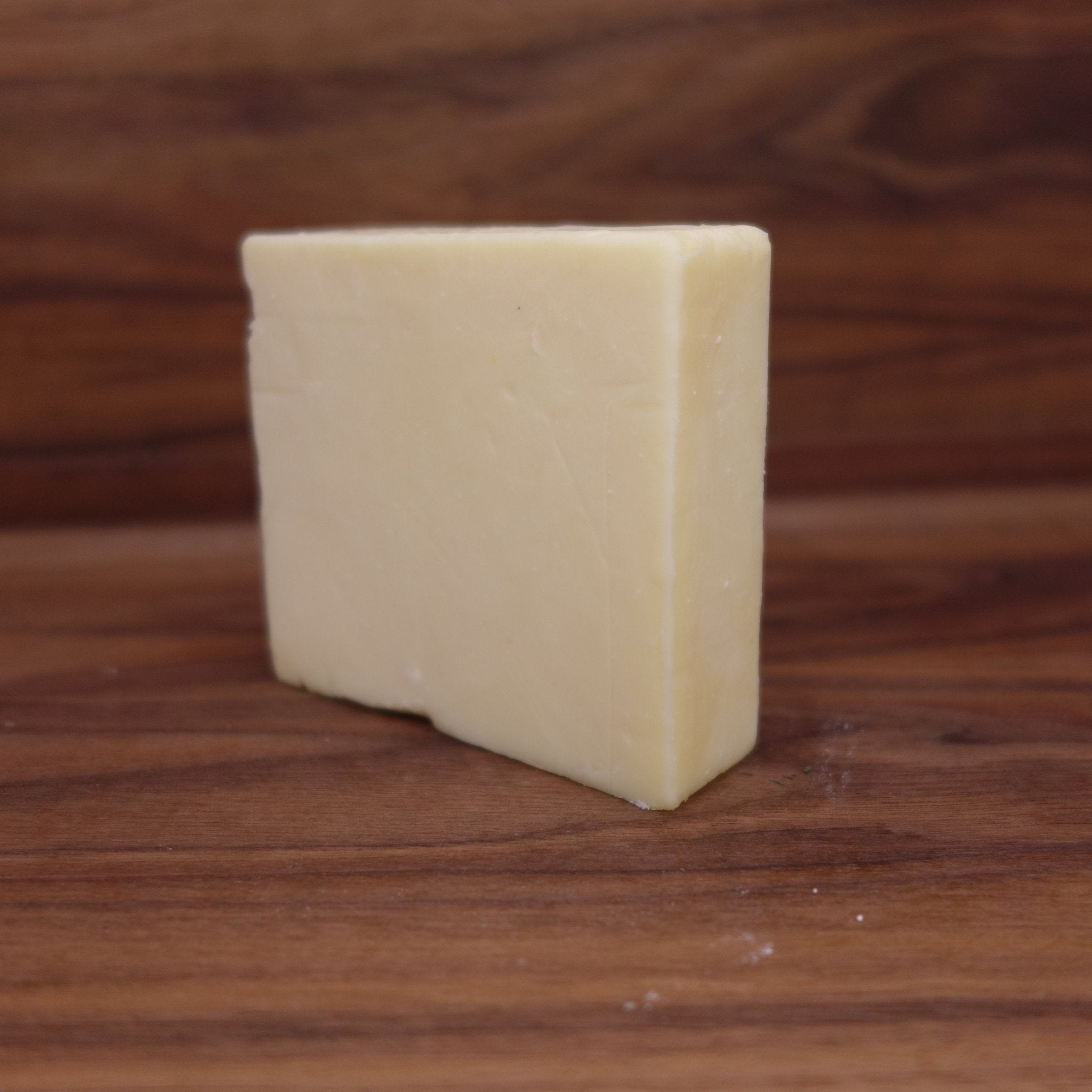 http://mongersprovisions.com/cdn/shop/products/hooks-8-year-cheddar-12-lb-795823.jpg?v=1644416788