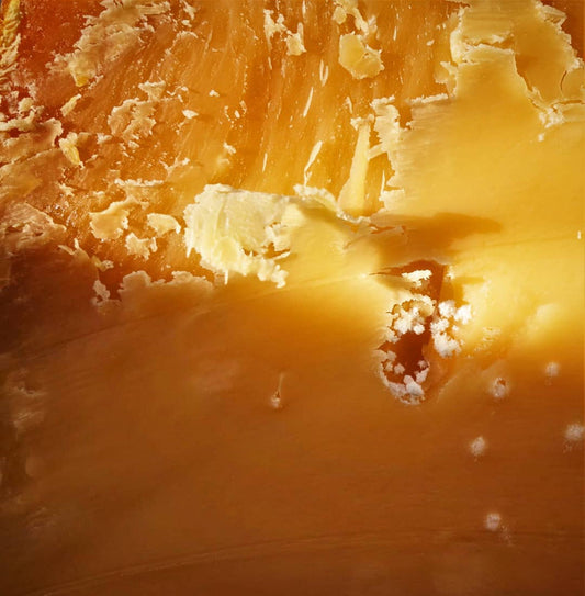 The Crystal Magic in Aged Cheese